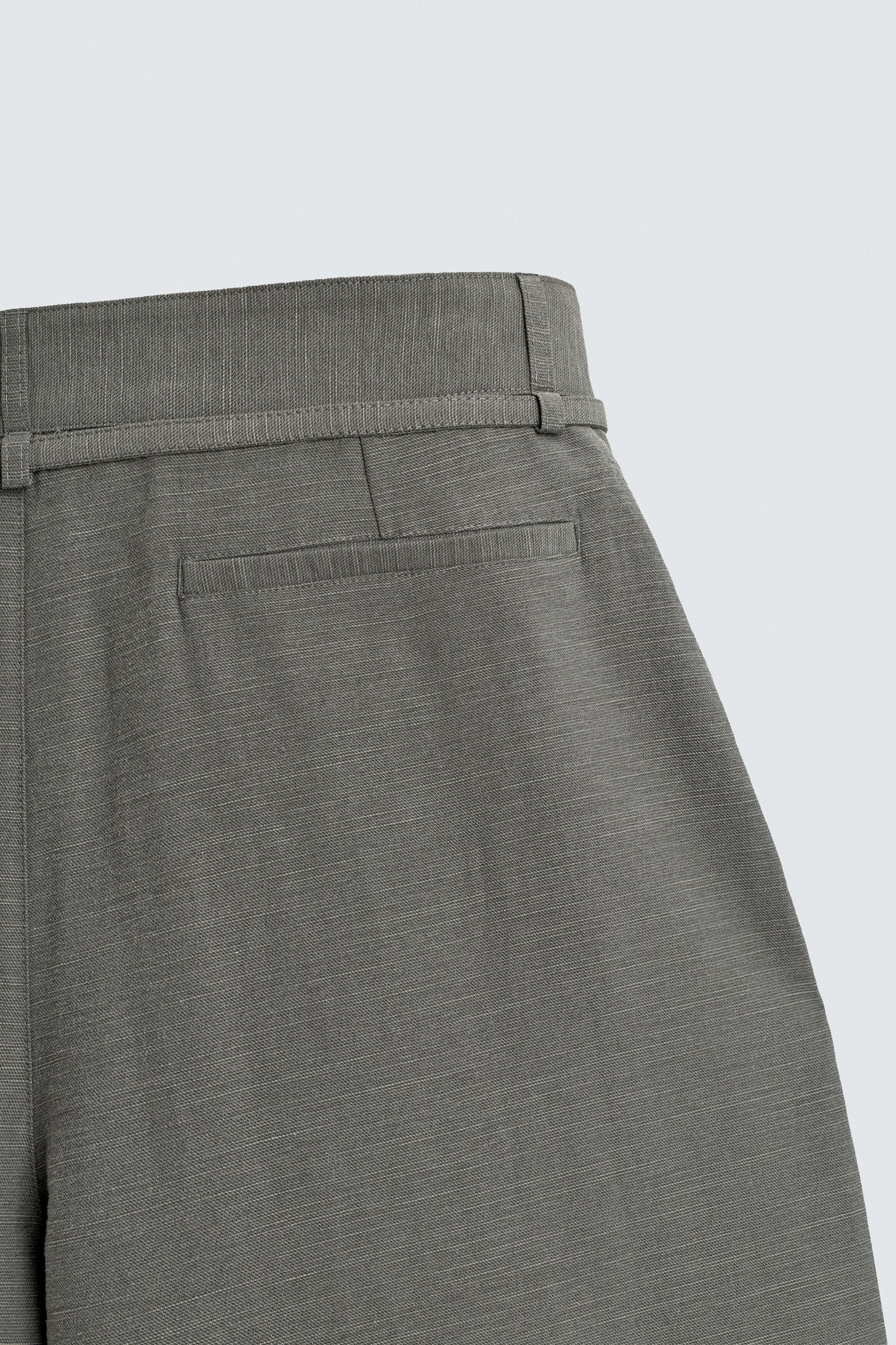 BALLOON FIT PLEATED BELTED PANTS